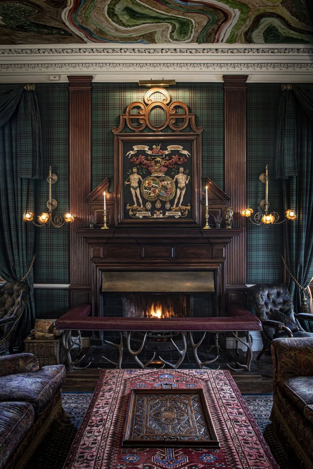 Panelled drawing room by the fire