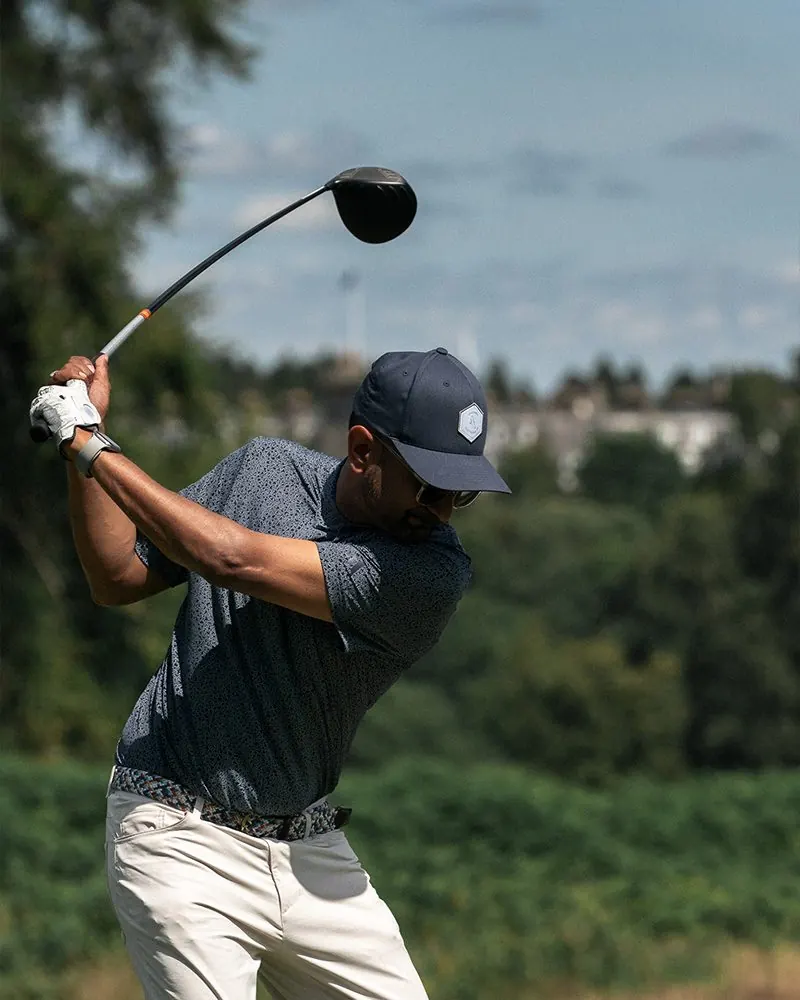 Golfer mid-swing