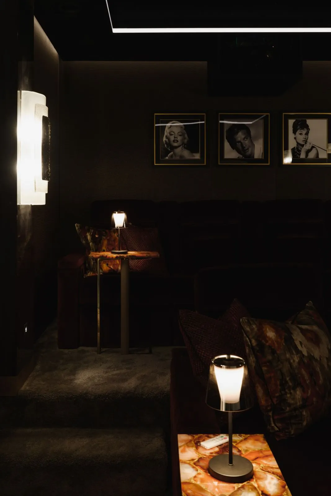 Cinema seating with backlit side table
