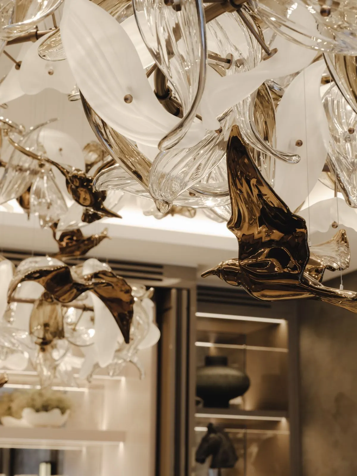 Glass chandelier over the dining room