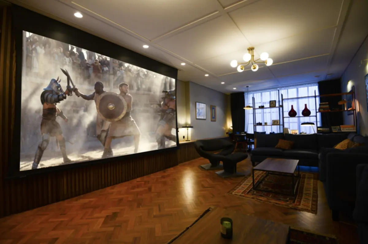 Drop-down screen across the living room