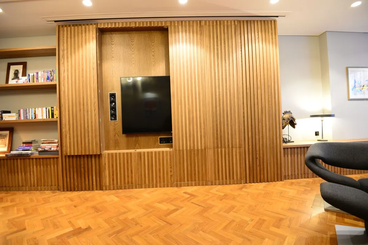Media wall with shelving