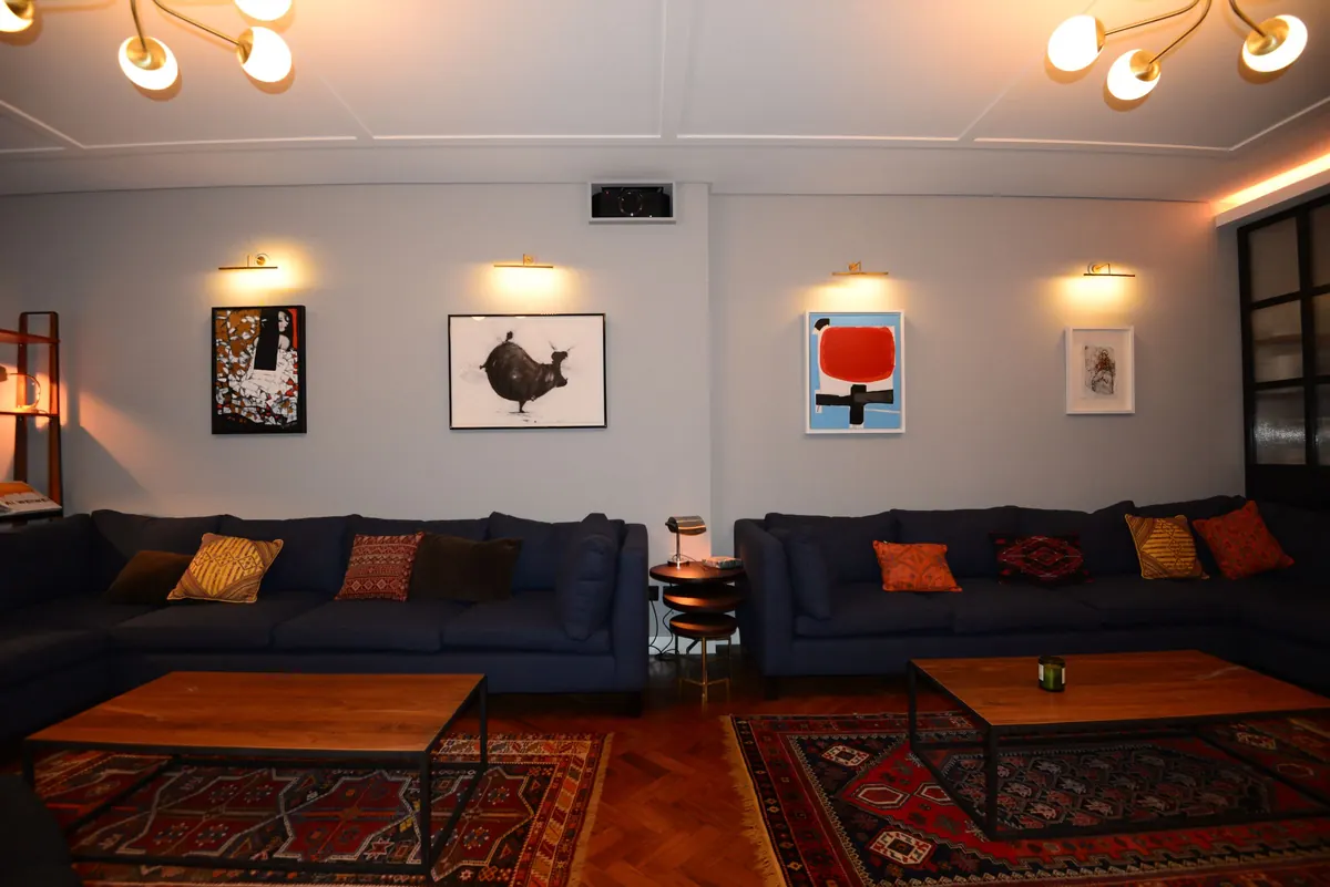 Drop-down screen across the living room