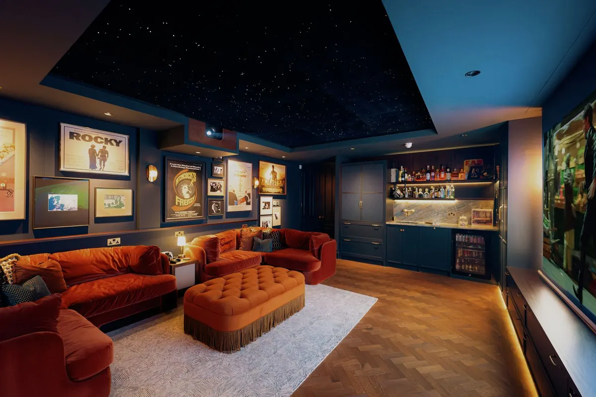 Cinema with poster wall and bar